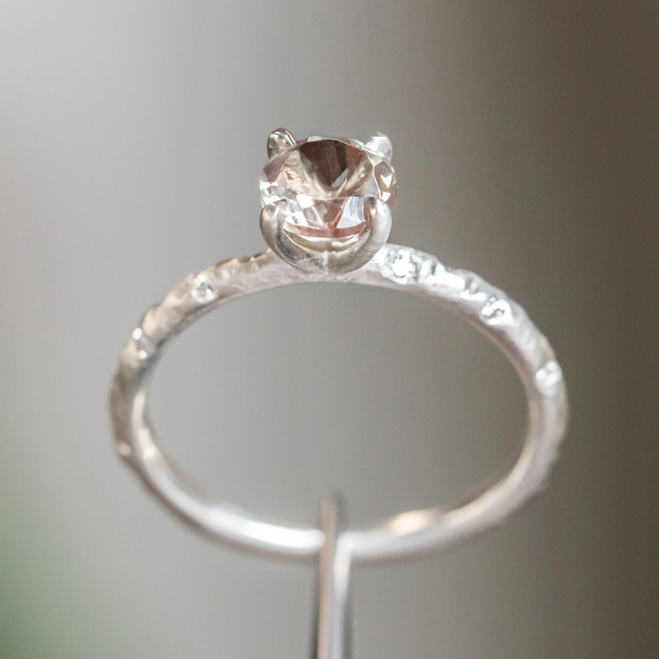 0.84ct Round Oregon Sunstone Solitaire Ring in Sterling Silver with Embedded Diamonds in Evergreen Texture