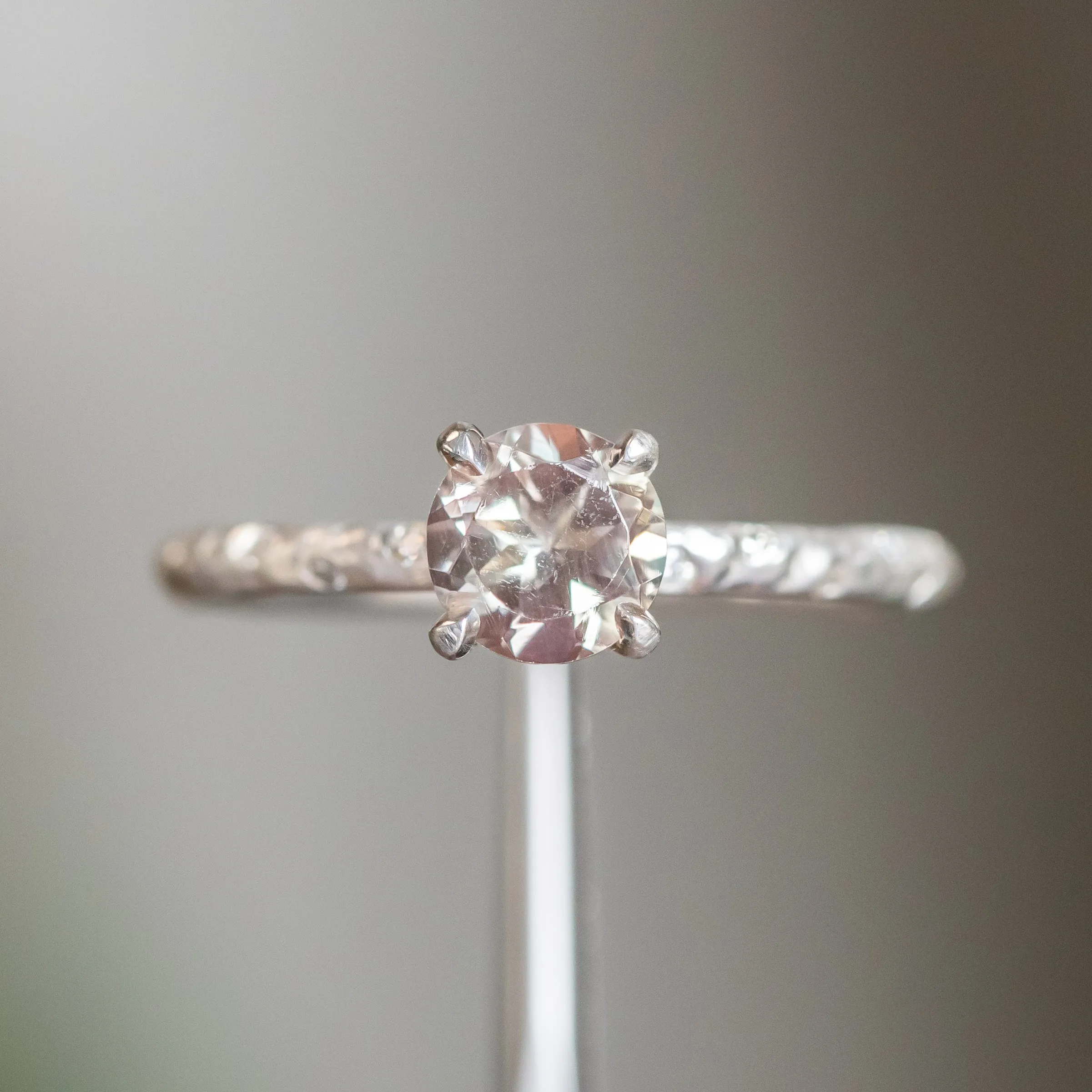 0.84ct Round Oregon Sunstone Solitaire Ring in Sterling Silver with Embedded Diamonds in Evergreen Texture