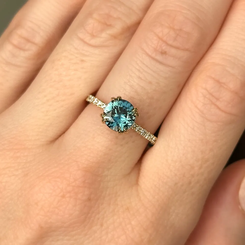 1.58ct Round Teal Sapphire Double Prong Solitaire with French Set Diamonds in 14k Yellow Gold