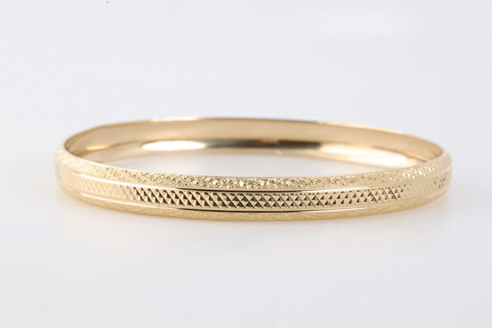 7.5" 14k Yellow Gold Textured Bangle Bracelet (9.87g.)