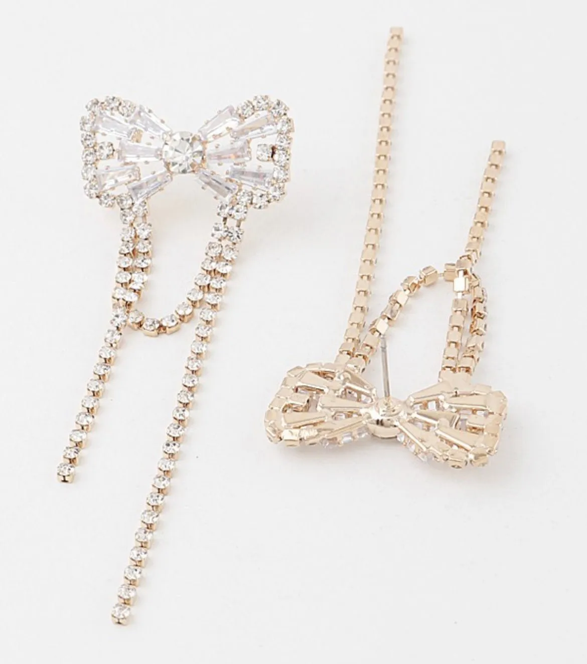 Gold crystal bow dangle earring