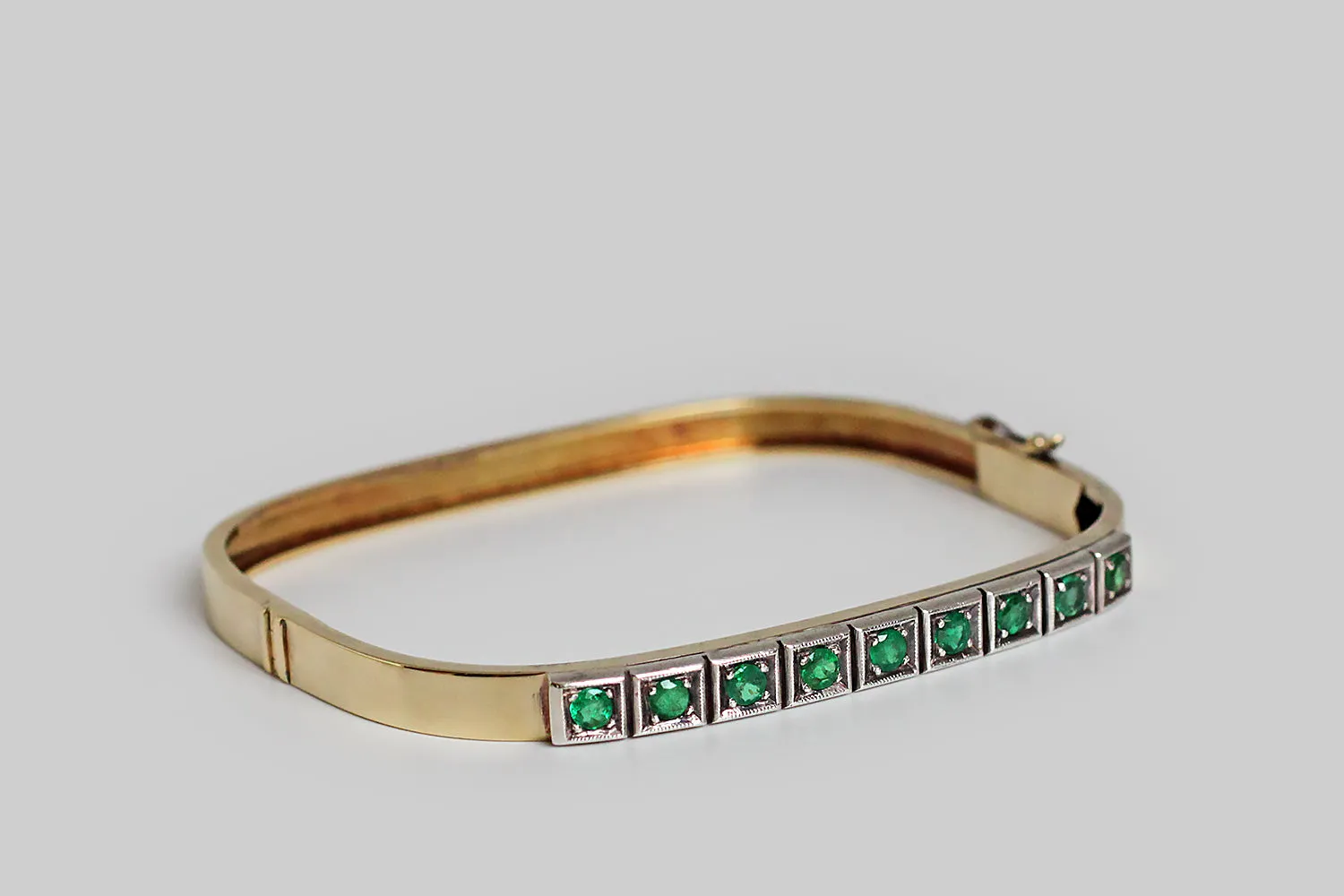 Vintage 1980s Rectangular Hinged Bangle Bracelet with Emeralds in 14k Gold